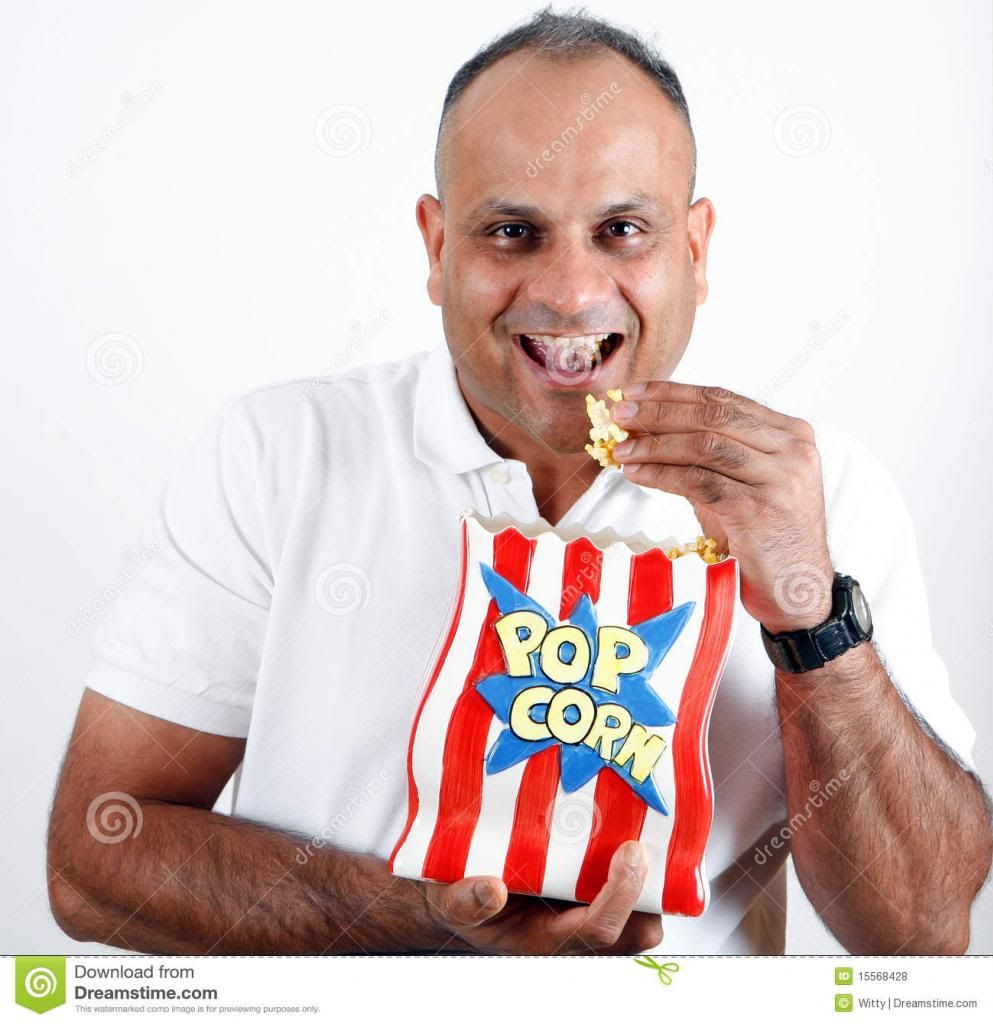 office-worker-eating-popcorn-15568428_zp