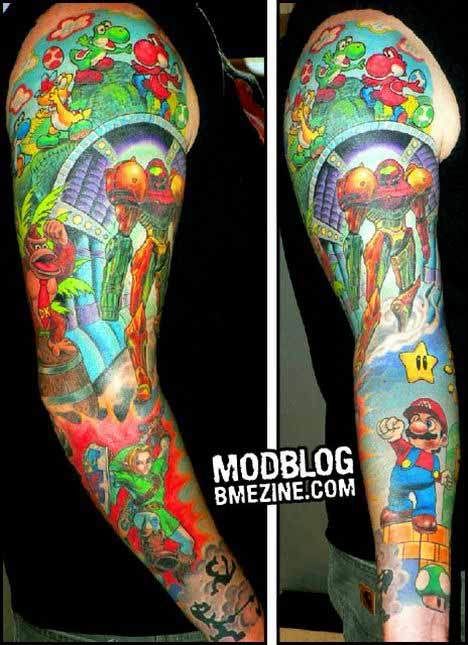 Video game console tattoo war. Best video game tattoo i have ever seen.