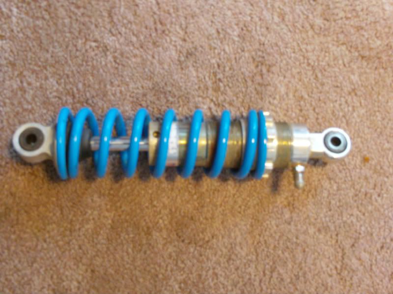 KX60 Forks, Tripples, Wheel, Brakes. Works Racing rear shock & some